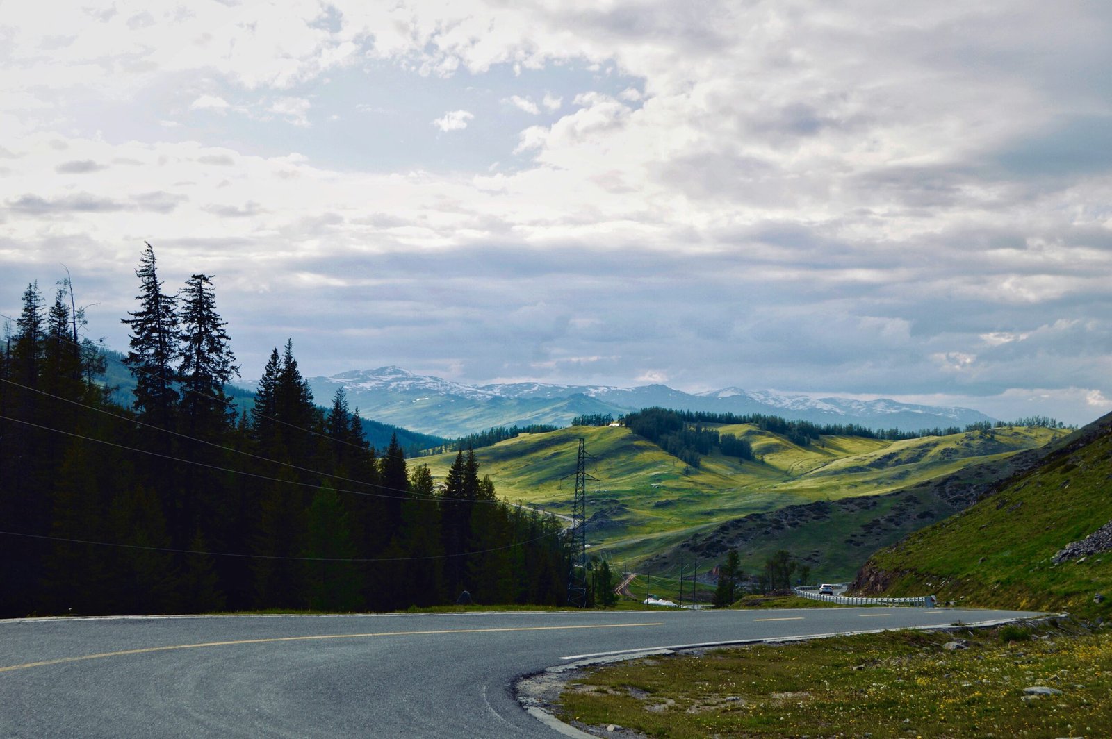 concrete road near mountains